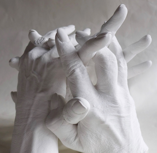 Handabformung von Mutter und Tochter